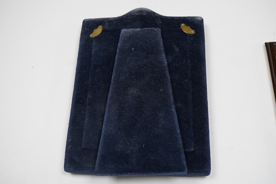 An Elizabeth II silver mounted photograph frame, with heart shaped aperture, Keyford Frames Ltd, Birmingham, 1992, 19cm by 14.4cm, together with an Italian 925 mounted rectangular photograph frame.